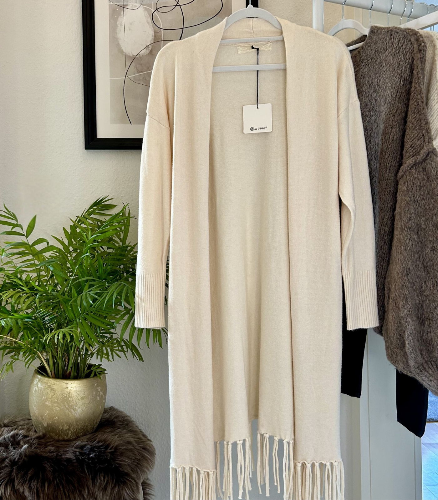 Strickmantel mit Fransen